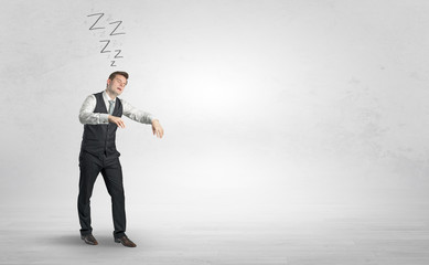 Tired businessman with sleeping sickness going somewhere
