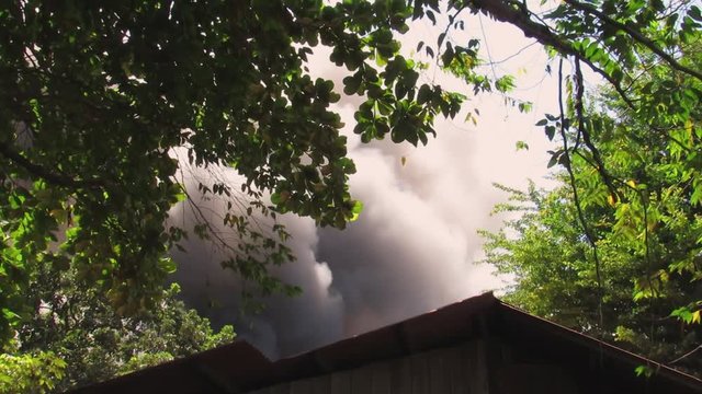 Fire Department Respond To A Blaze Involving A Number Of Houses In The Philippines