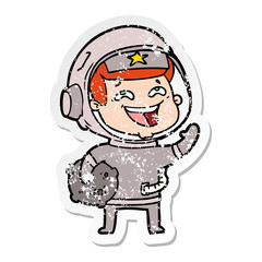 distressed sticker of a cartoon laughing astronaut