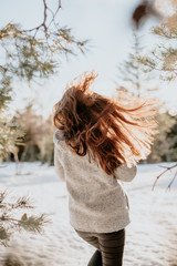 Woman enjoys a winter sunny day 