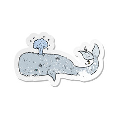 retro distressed sticker of a cartoon whale