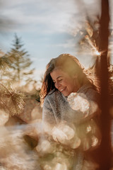 Woman enjoys a winter sunny day 