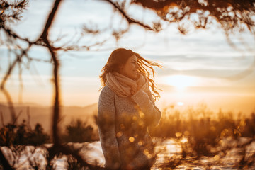 Woman enjoys a winter sunny day 