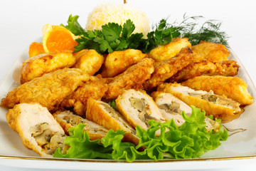 Appetizer of meat with lettuce and vegetables