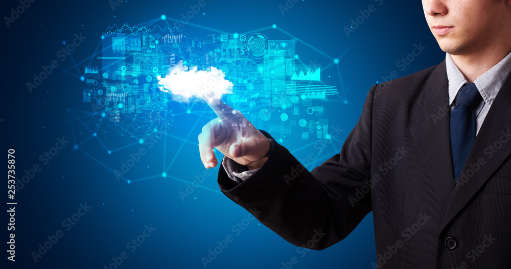 Poster Man touching hologram projection displaying information from cloud based system
