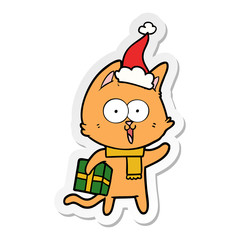 funny sticker cartoon of a cat wearing santa hat