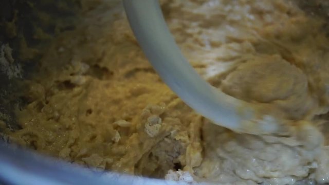 Extreme Macro Close Up, Chunky bread dough mixed by spiral hook in stand mixer