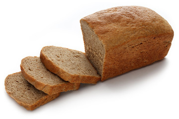 Loaf of fresh delicious dark bread, isolated on white background