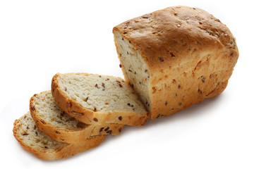 Loaf of fresh delicious bread with raisin, isolated on white background