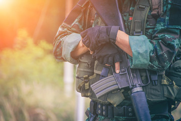 Soldiers carrying guns, stay.