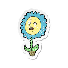 retro distressed sticker of a cartoon flower with face