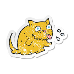 retro distressed sticker of a cartoon cat blowing raspberry