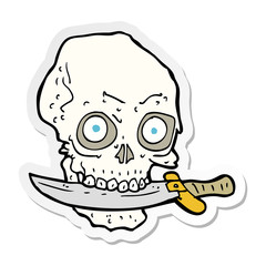 sticker of a cartoon pirate skull with knife in teeth