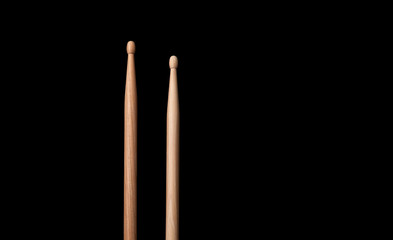 drum stick on black background