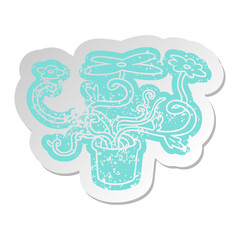 distressed old sticker of a flower plant