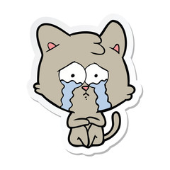 Obraz na płótnie Canvas sticker of a crying cat cartoon