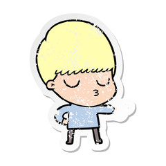 Obraz premium distressed sticker of a cartoon calm boy