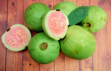  guava - fresh guava fruit with a wooden background