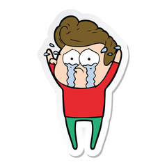 sticker of a cartoon crying man