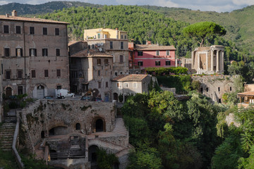 TIVOLI, ITALY - 5 OCTOBER 2018: The view of ancient buildings, Vesta temple and stairs with...