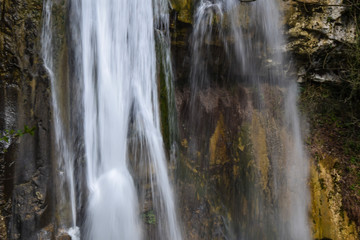 waterfall flowing in jungle wilderness landscape