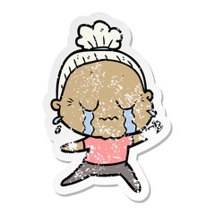 distressed sticker of a cartoon crying old lady
