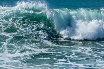 Fototapeta na wymiar Wave Breaking on Fistral beach, North Cornwall Coastline