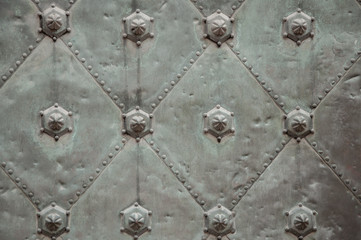Ancient gray metal door