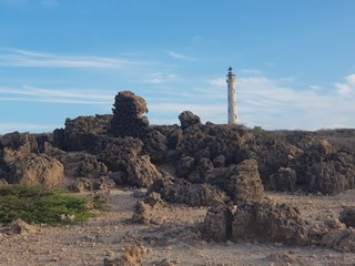 Picture postcard with a very beautiful lighthouse in as a background