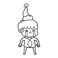 line drawing of a boy crying wearing santa hat