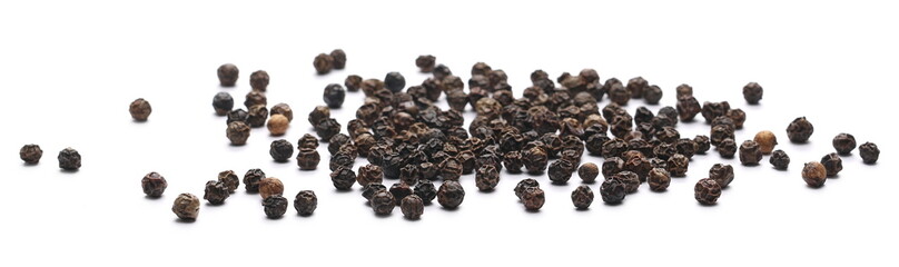 Black pepper grains isolated on white background