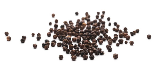Black pepper grains isolated on white background