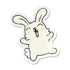 distressed sticker of a quirky hand drawn cartoon rabbit