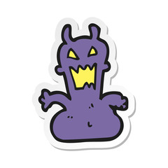 sticker of a cartoon little alien