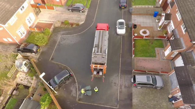 Aerial View of Dustmen putting recycling waste into a waste truck, Bin Men, Recycling day, refuse collection in Stoke on Trent, Staffordshire