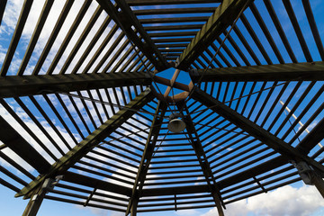 Octaganol open-air architectural roof element along a pier in Alexandria, Virginia