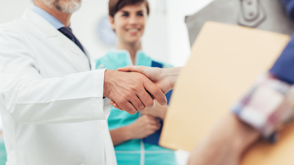 Medical staff welcoming a patient