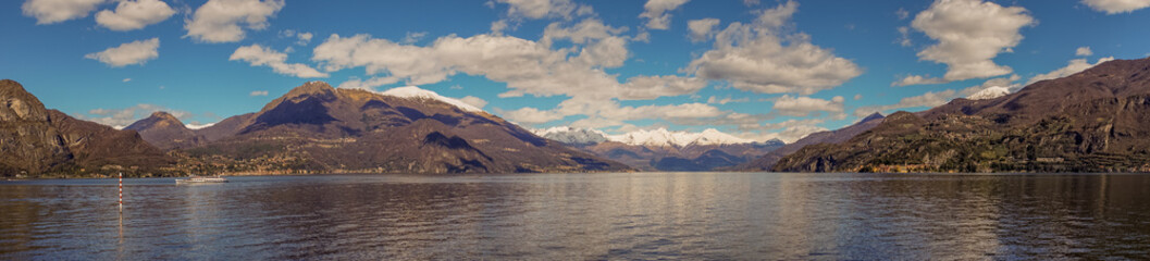 Italy, Bellagio, Lake Como, SCENIC VIEW OF SNOWCAPPED MOUNTAINS AGAINST BLUE SKY, Lombardy