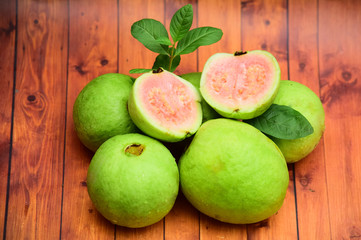  guava - fresh guava fruit with a wooden background