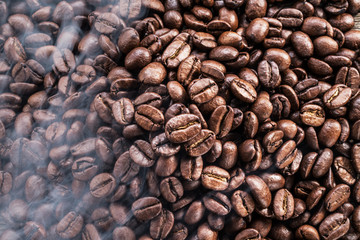 Roasted coffee beans. Food and drink background. Top view.