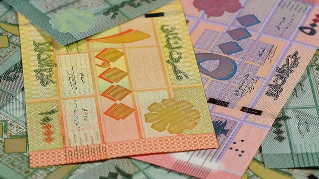 Lebanon pound banknotes rotating. Lebanese money, currency, investment. Low angle. Stock video footage