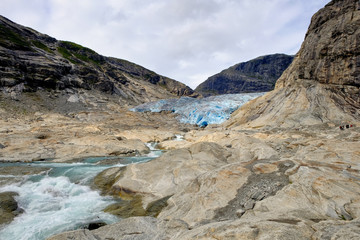 Fototapeta na wymiar Nigardsbreen glacier, a beautiful arm of the large Jostedalsbreen glacier. Nigardsbreen lies about 30 kilometres north of the village of Gaupne in the Jostedalen valley, Norway, Europe
