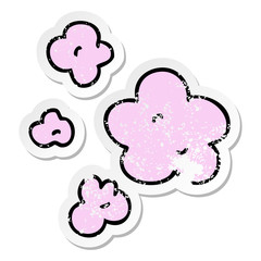 distressed sticker of a quirky hand drawn cartoon clouds