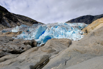 Obraz premium Nigardsbreen glacier, a beautiful arm of the large Jostedalsbreen glacier. Nigardsbreen lies about 30 kilometres north of the village of Gaupne in the Jostedalen valley, Norway, Europe