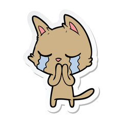sticker of a crying cartoon cat