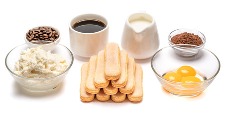 Ingredients for cooking tiramisu Savoiardi biscuit cookies, mascarpone, cream, sugar, cocoa, coffee and egg isolated on white background. Clipping path