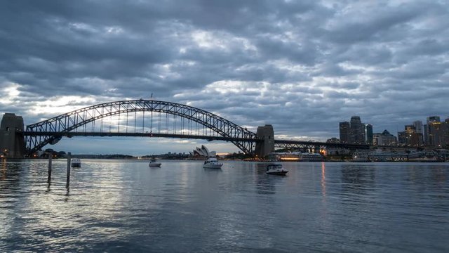 SYDNEY, AUSTRALIA - SEPTEMBER 16, 2016: 4K Cinematic Panning Left to Right Time Lapse Footage for Sydney city skyline at sunrise, taken from Blues Point Reserve north of Sydney.
