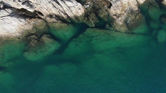 Aerial view of ocean waves and fantastic Rocky coast.