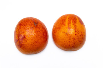 red oranges on a white background.