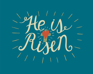 Hand lettering He is risen with a cross on blue background.